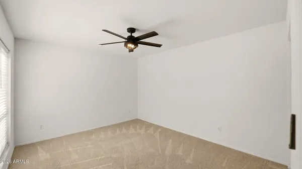 a view of a big room with carpet