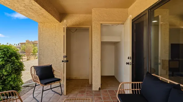 a view of a grey door of the house