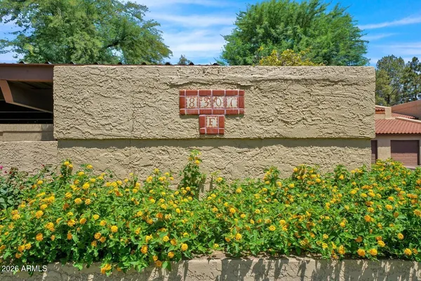 a front view of a building with street view