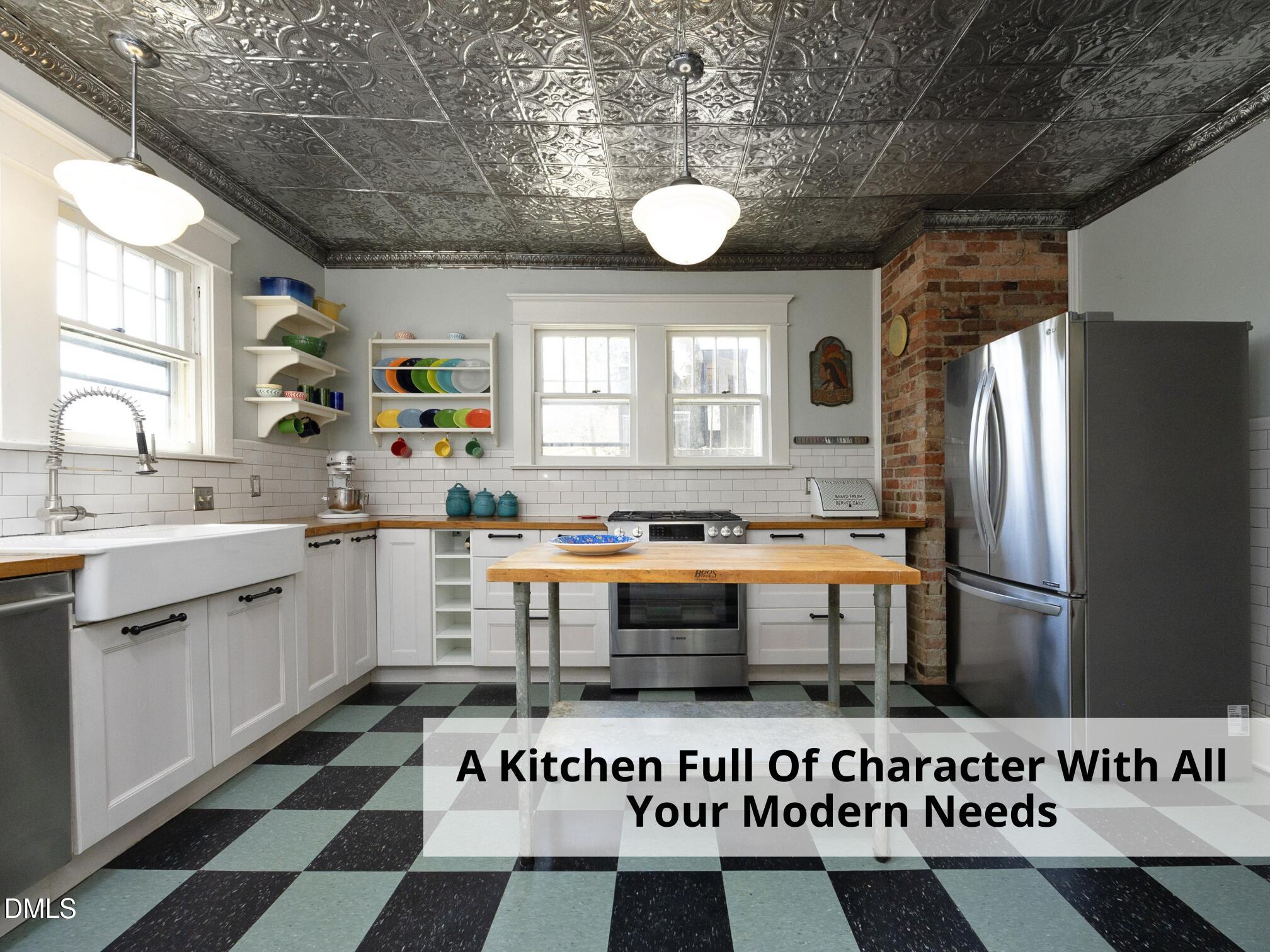 825 Onslow Street Durham, NC 27705 - Photo 23 of 71 a kitchen with a refrigerator and a sink
