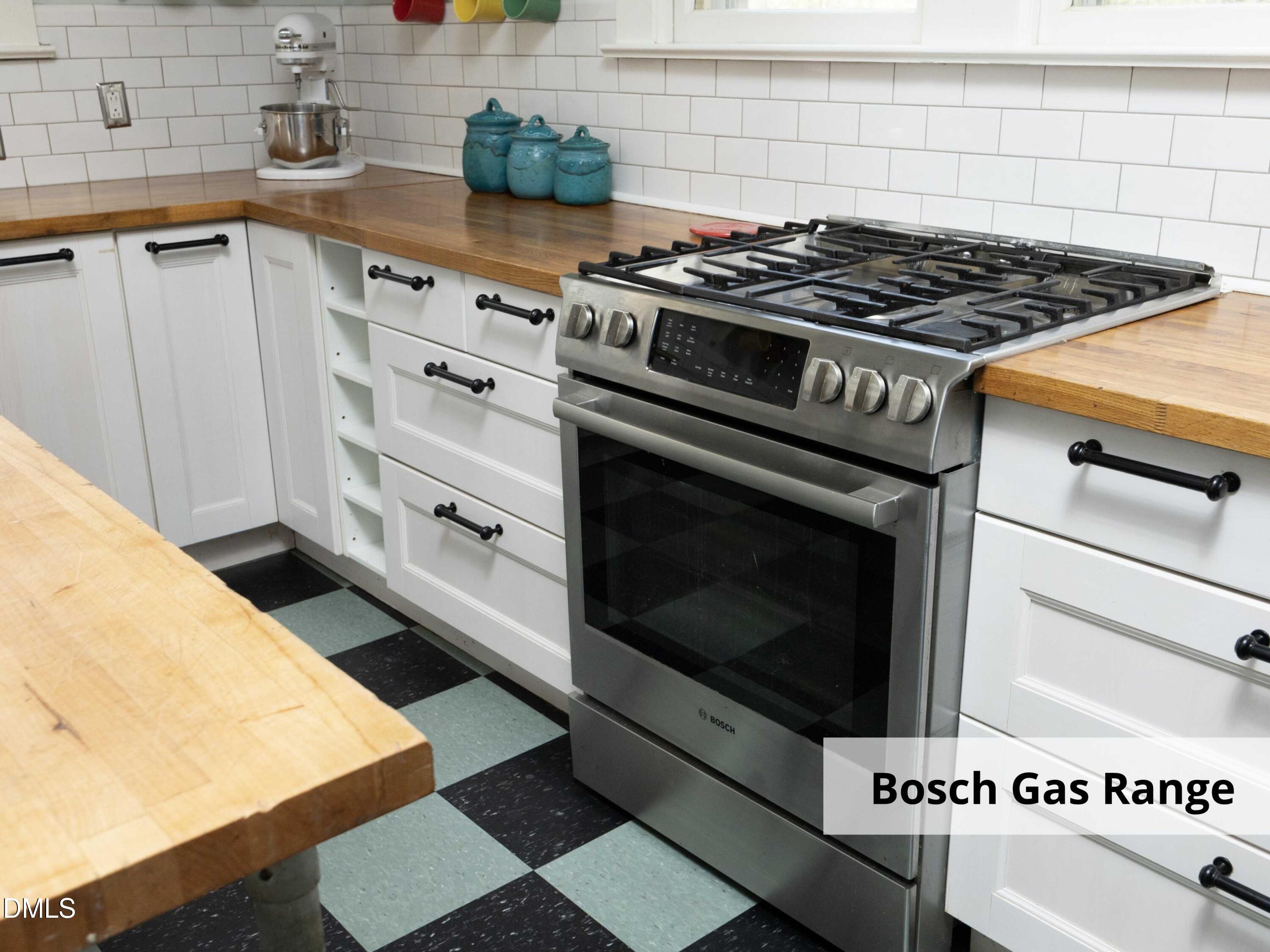 825 Onslow Street Durham, NC 27705 - Photo 29 of 71 a stove top oven sitting inside of a kitchen