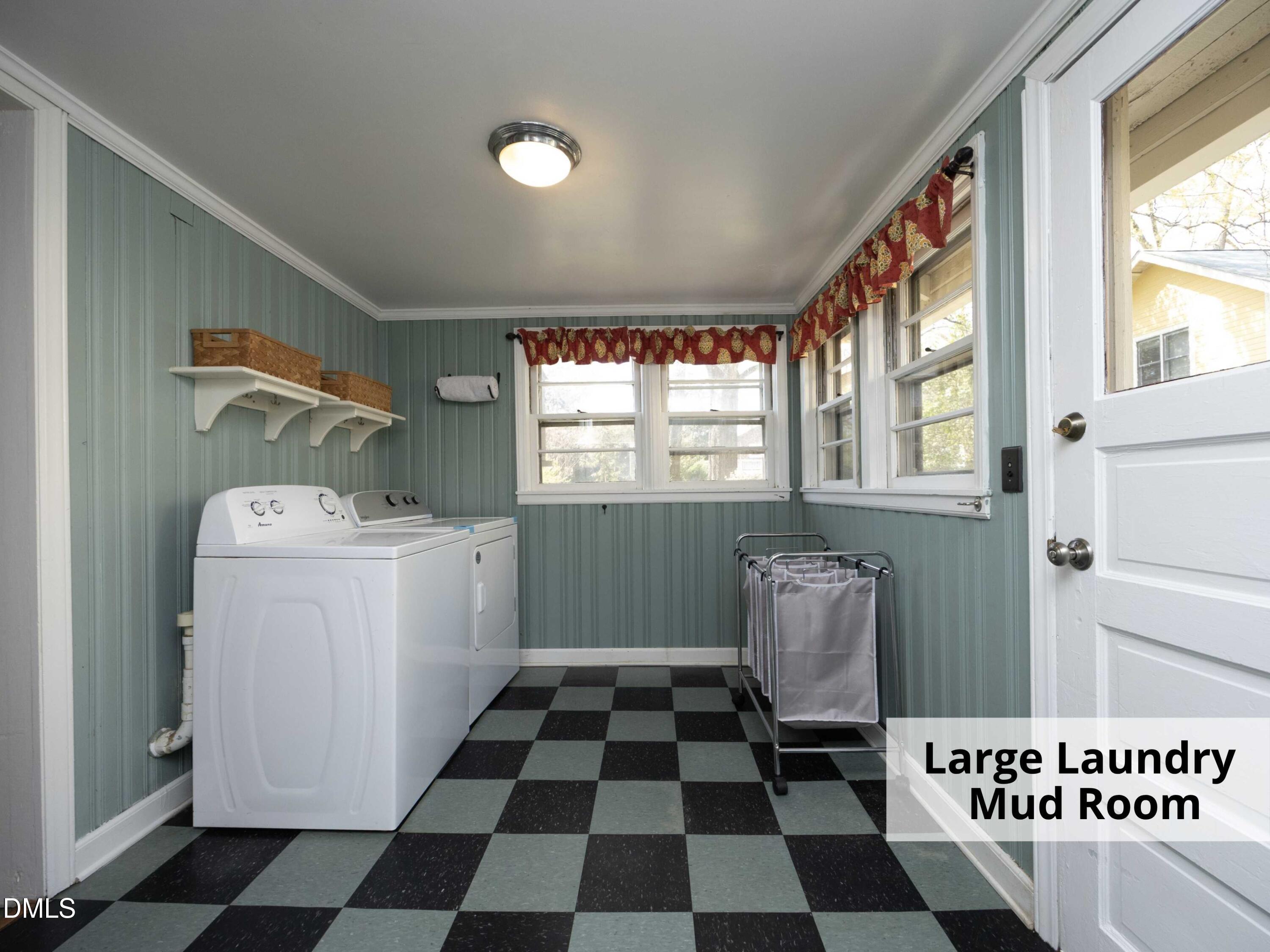 825 Onslow Street Durham, NC 27705 - Photo 31 of 71 a room with a black white checkered floor with a black white checkered floor and a window
