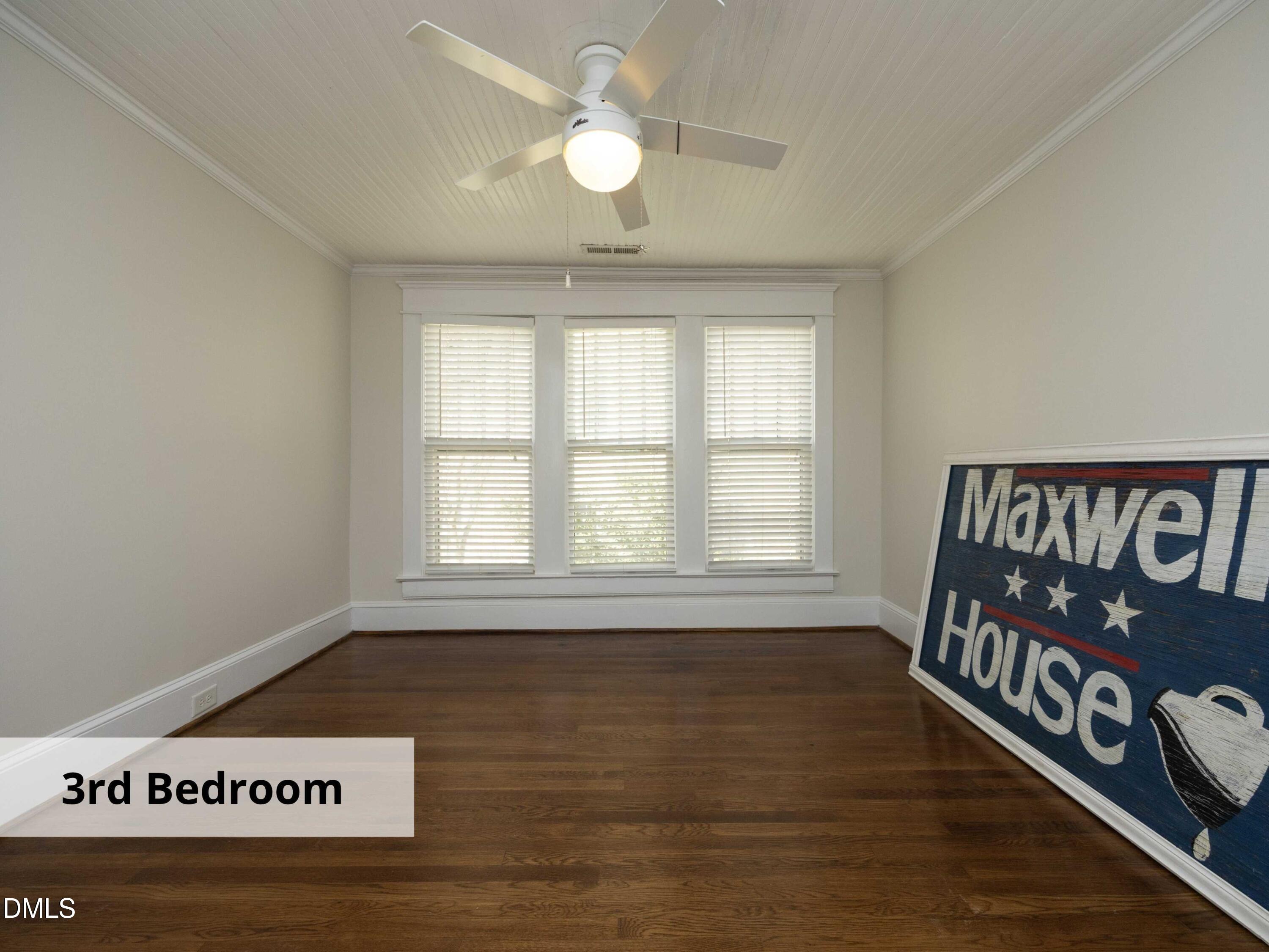 825 Onslow Street Durham, NC 27705 - Photo 41 of 71 a view of an empty room with window and wooden floor