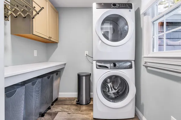 a utility room with dryer and washer