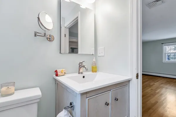 a bathroom with a sink and a toilet