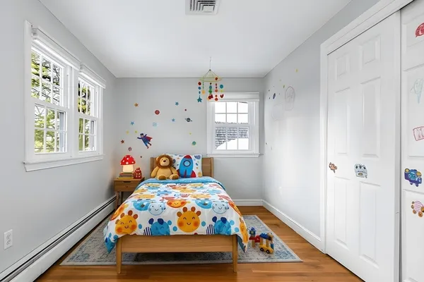 a room with window and furniture