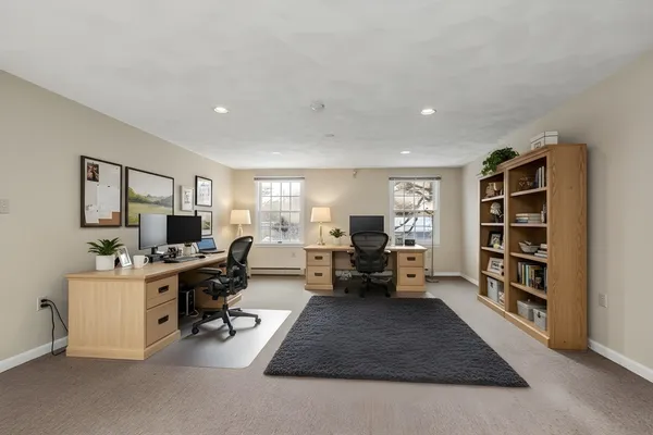 a living room with furniture window and piano table