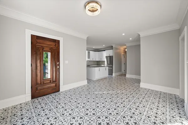 a bathroom with a toilet a sink and a mirror