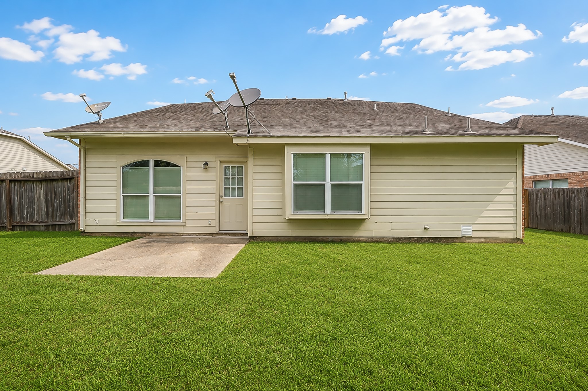 631 Timberstand Lane Spring, TX 77373 - Photo 37 of 38 The backyard offers a spacious outdoor area with a patio, plenty of green space, and room to create your own outdoor retreat.