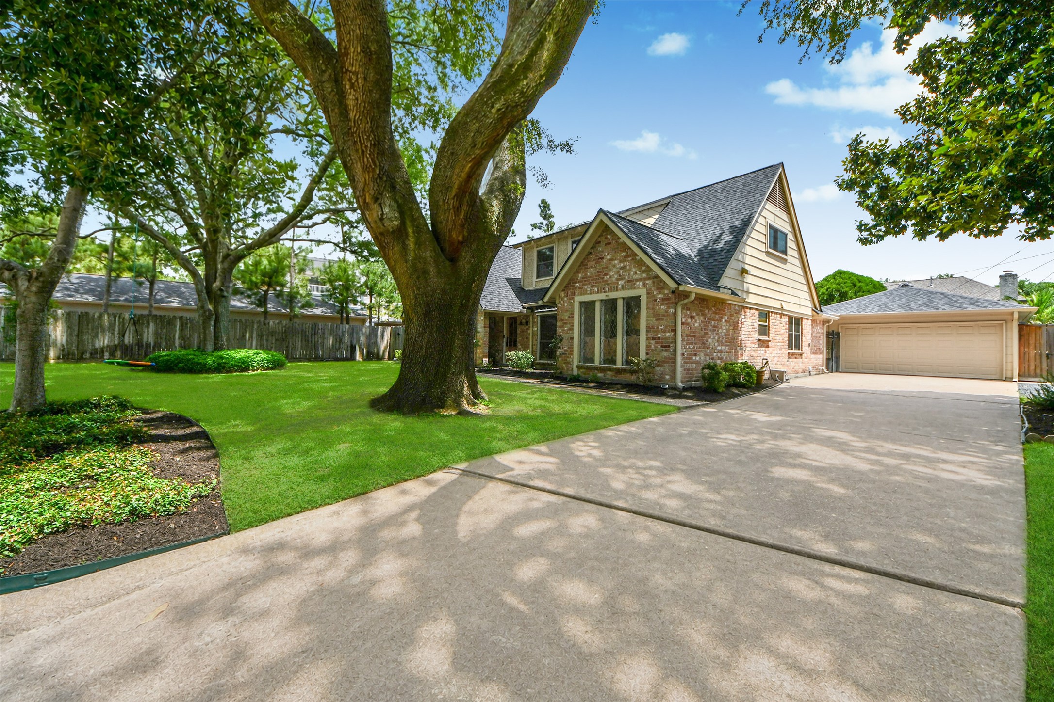 3030 Bernadette Lane Houston, TX 77043 - Photo 27 of 31 a front view of a house with a yard