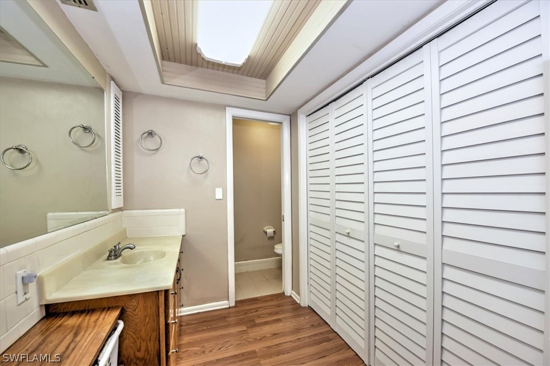 12271 Coyle Road Fort Myers, FL 33905 - Photo 18 of 33 a bathroom with a sink and a window