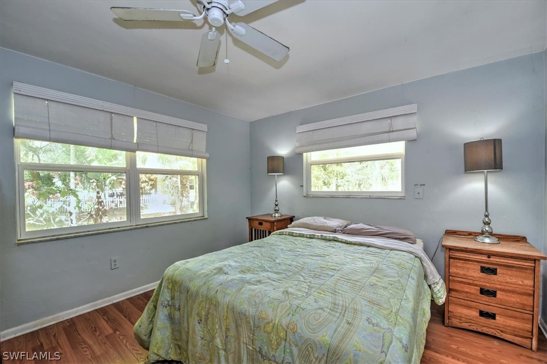 12271 Coyle Road Fort Myers, FL 33905 - Photo 19 of 33 a bedroom with a bed and a window