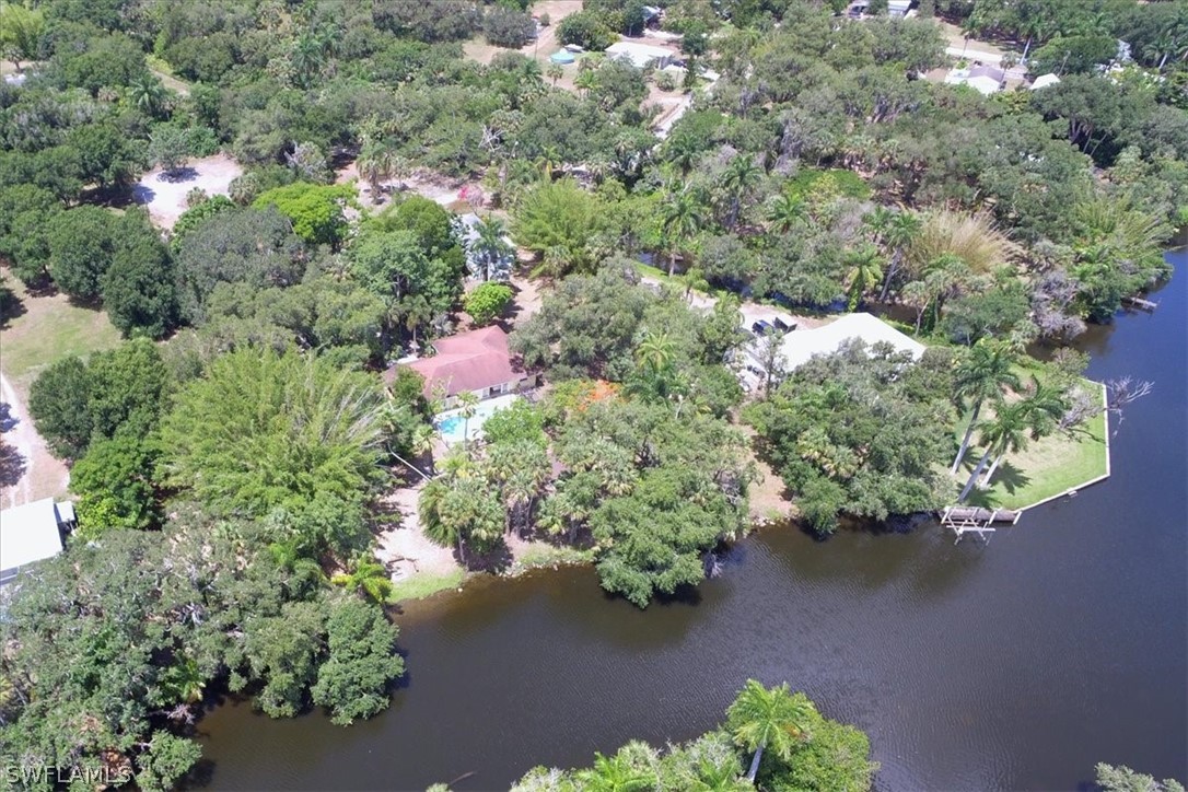 12271 Coyle Road Fort Myers, FL 33905 - Photo 21 of 33 an aerial view of a house with a yard and garden