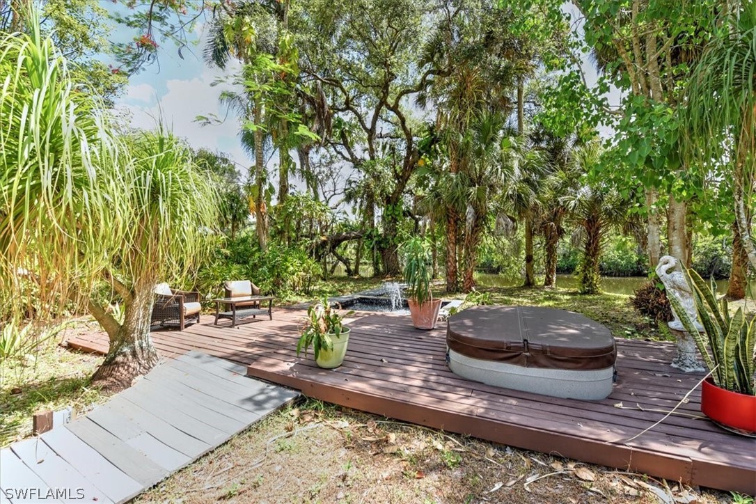 12271 Coyle Road Fort Myers, FL 33905 - Photo 28 of 33 a view of a backyard with sitting area