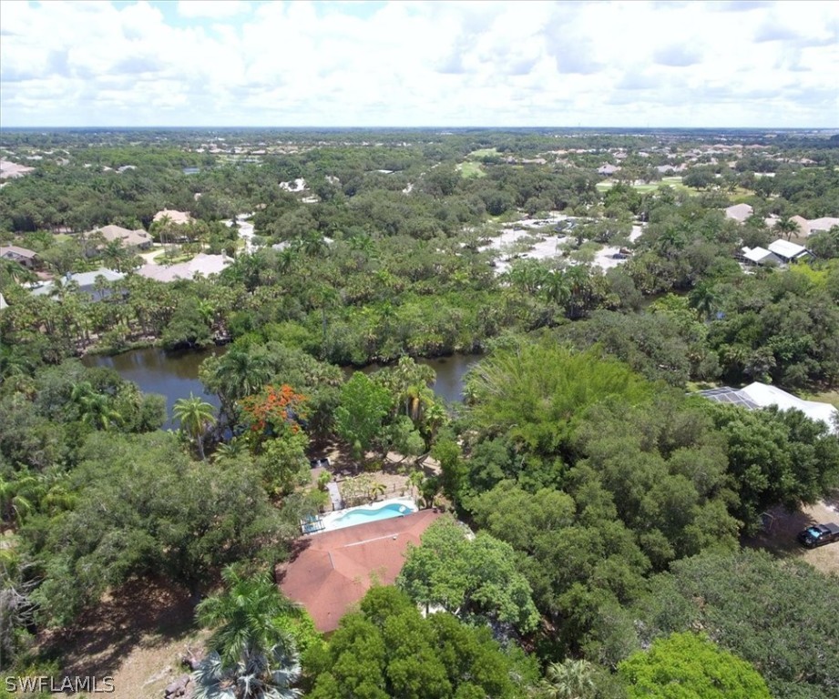 12271 Coyle Road Fort Myers, FL 33905 - Photo 7 of 33 an aerial view of residential houses with city view and lake view