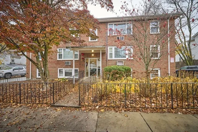 front view of a house with a trees