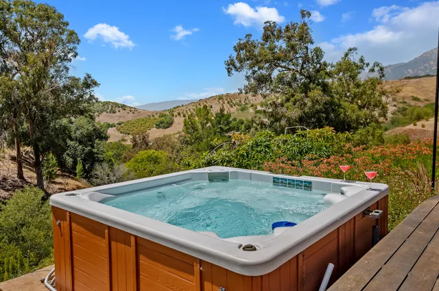 a view of swimming pool from a balcony
