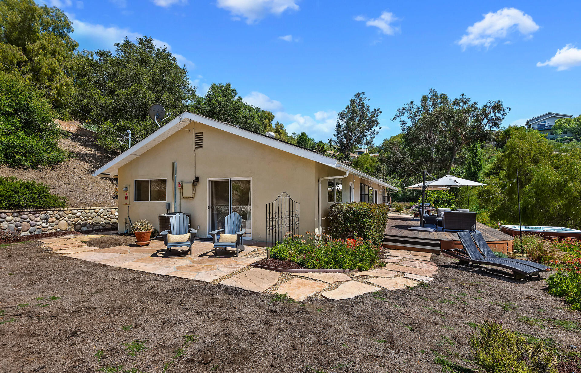 Undisclosed Address Santa Barbara, CA 93105 - Photo 16 of 30 a backyard of a house with table and chairs