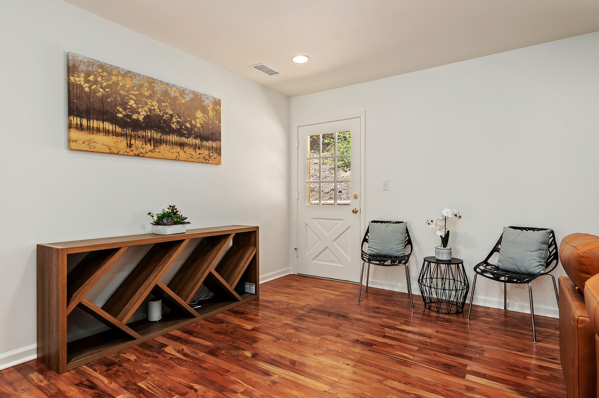 Undisclosed Address Santa Barbara, CA 93105 - Photo 17 of 30 a view of a workspace with furniture and wooden floor
