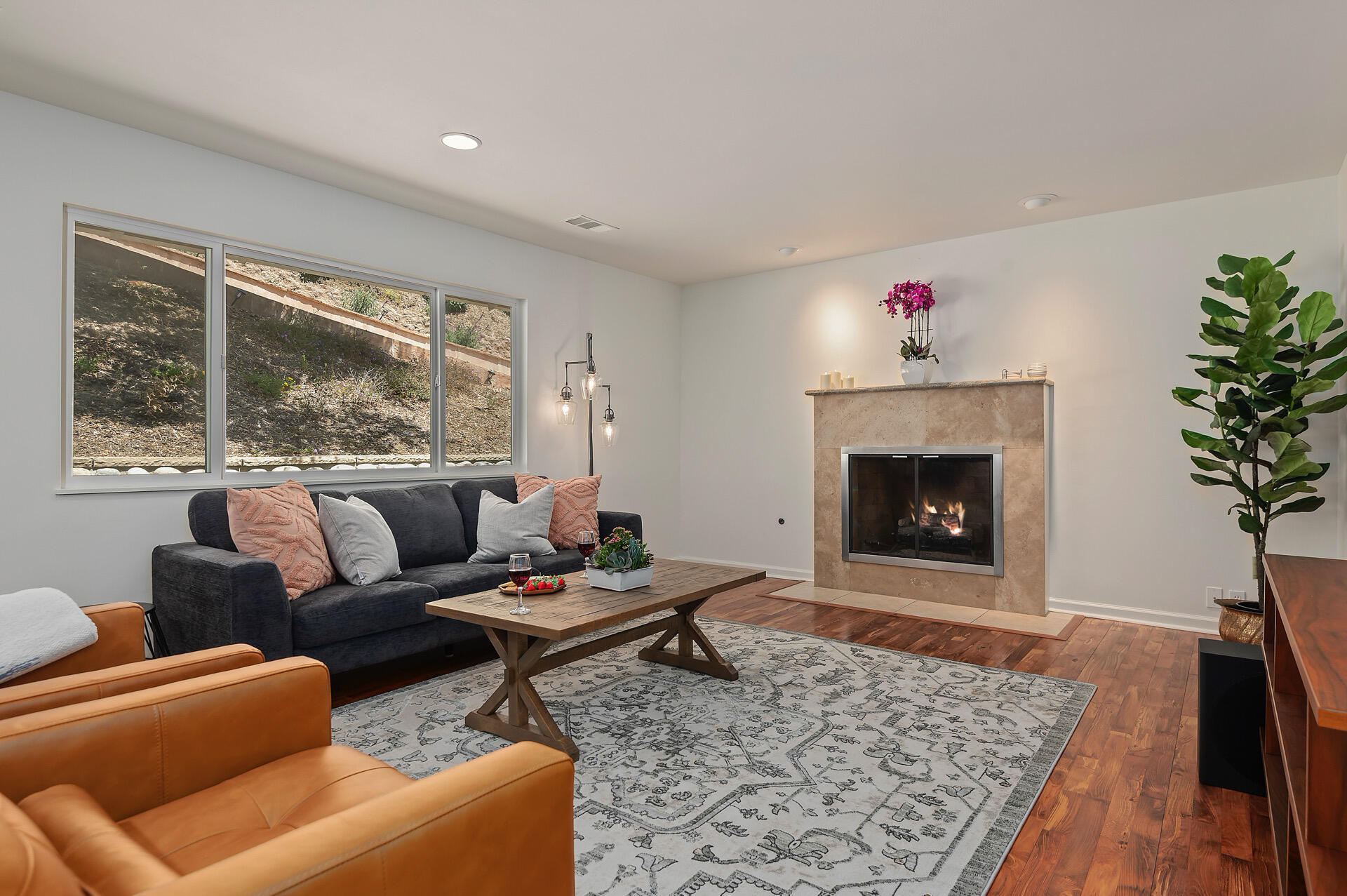 Undisclosed Address Santa Barbara, CA 93105 - Photo 18 of 30 a living room with furniture and a fireplace