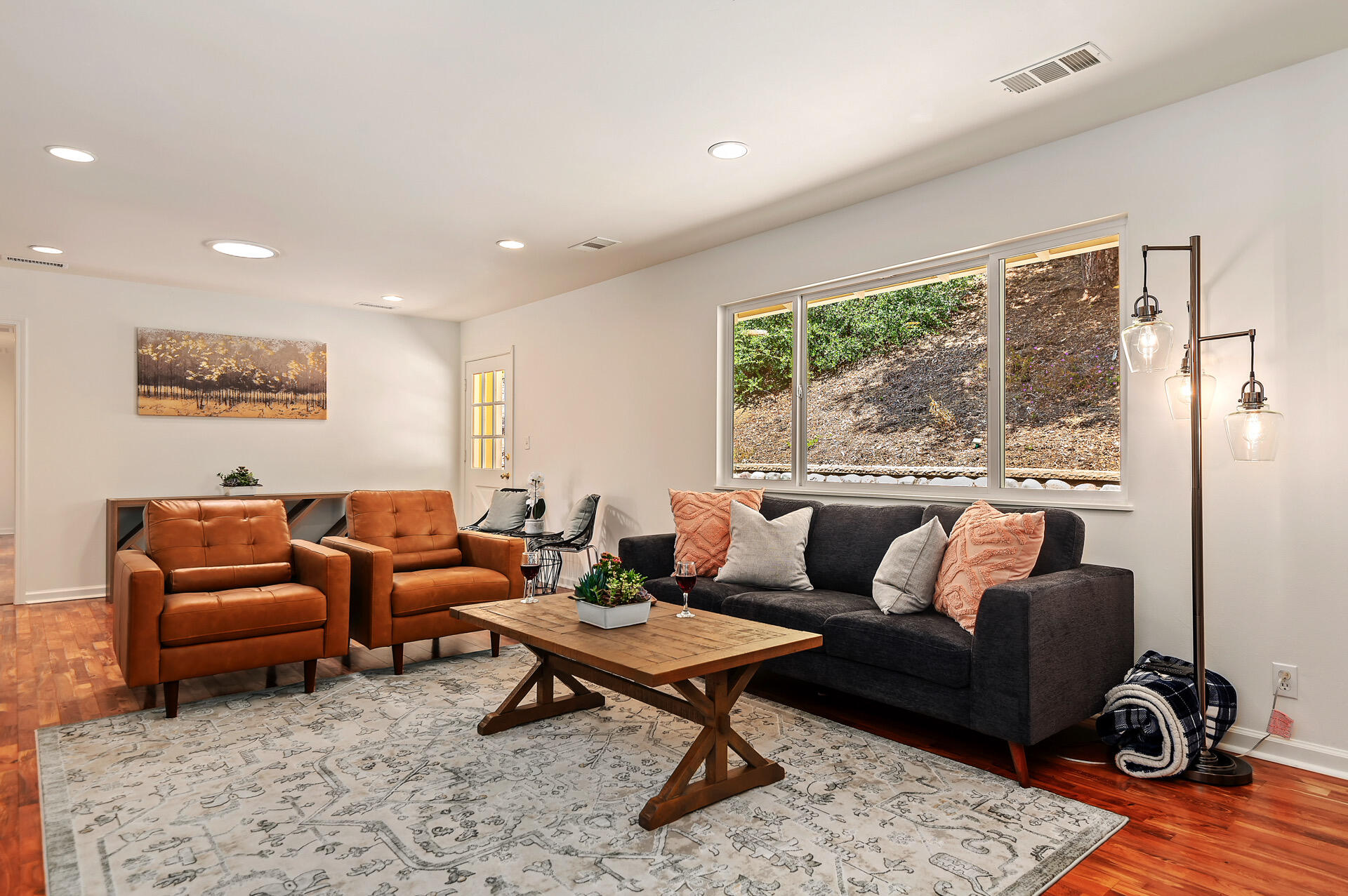 Undisclosed Address Santa Barbara, CA 93105 - Photo 20 of 30 a living room with furniture a rug and a large window
