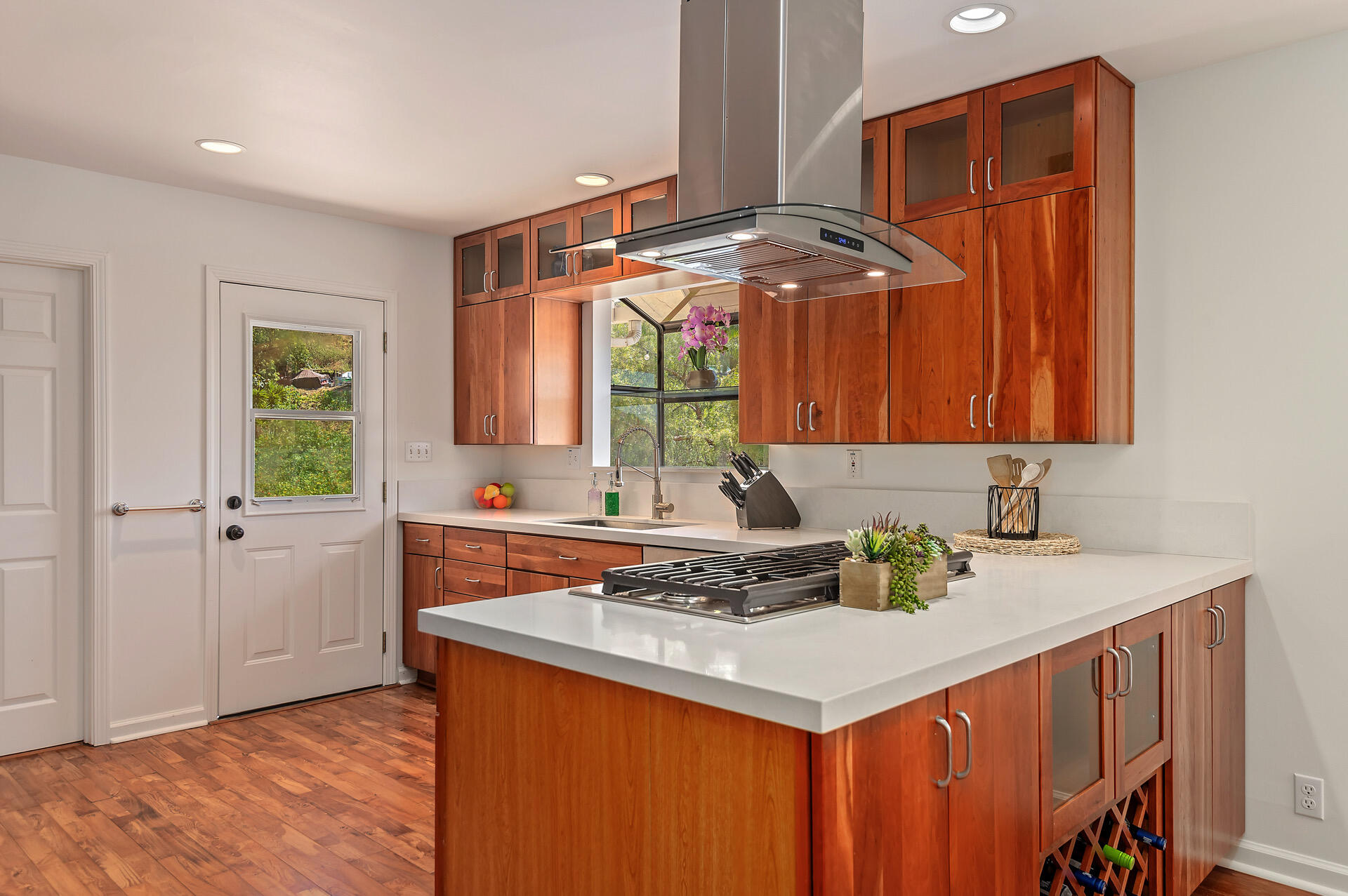 Undisclosed Address Santa Barbara, CA 93105 - Photo 22 of 30 a kitchen that has a sink and a stove in it