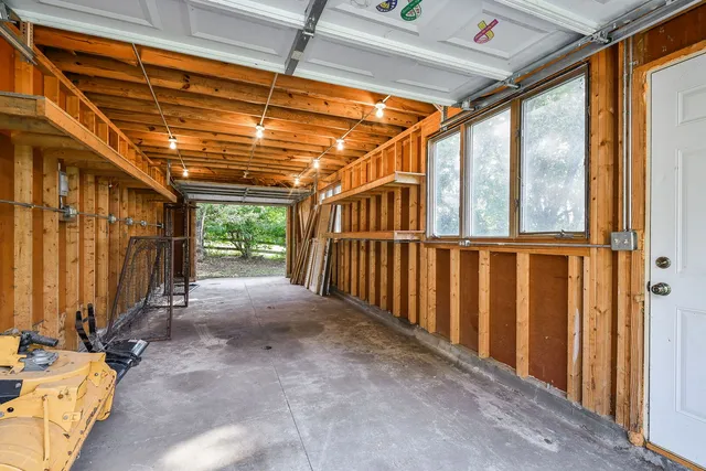 a view of a porch with wooden floor and roof