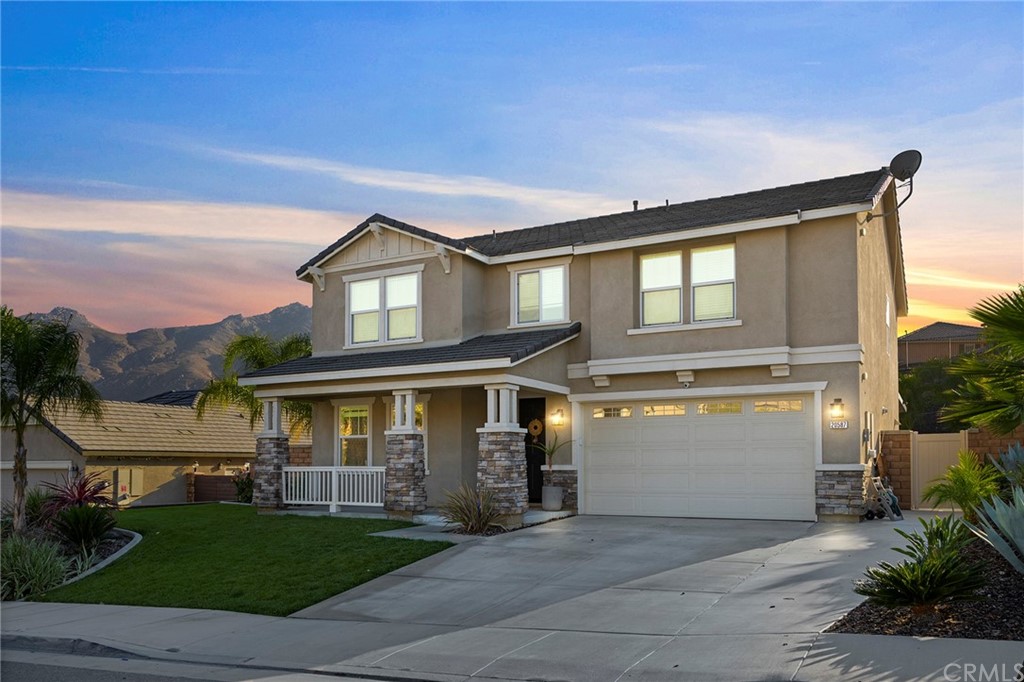20587 Lyon Road Riverside, CA 92507 - Photo 1 of 1 a front view of a house with a garden