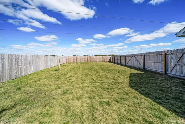 a view of a garden with an outdoor space