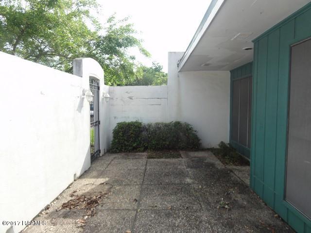 217 Eraste Landry Road Lafayette, LA 70506 - Photo 2 of 15 FRONT PATIO