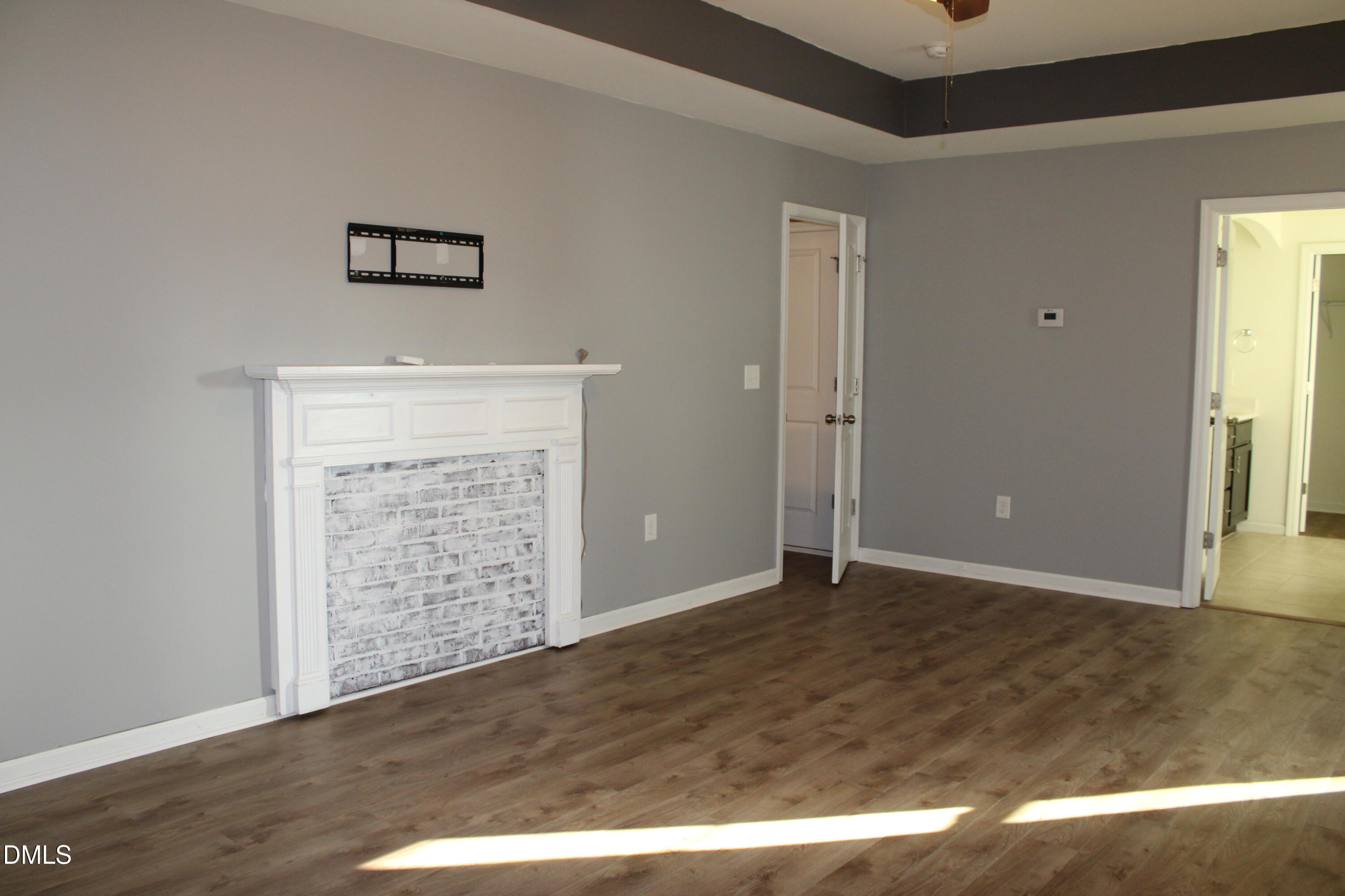 138 Lyonshall Street Fuquay-Varina, NC 27526 - Photo 14 of 24 an empty room with windows