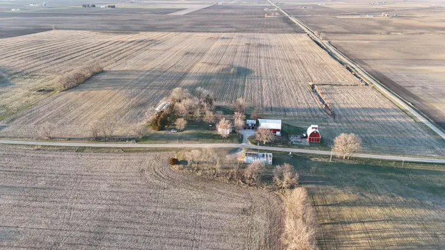 a view of swimming pool with sitting area