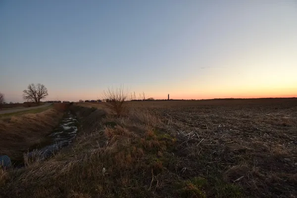 a view of an ocean beach and mountain