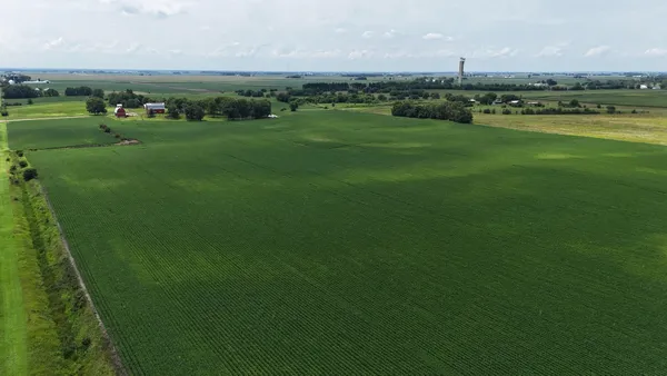 a view of a field with an outdoor space