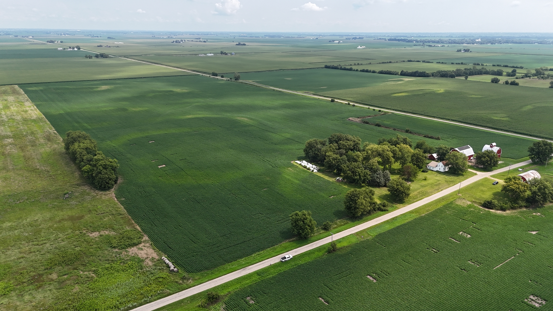 0 Jersey Road Tampico, IL 61283 - Photo 6 of 16 a view of a lake with a yard