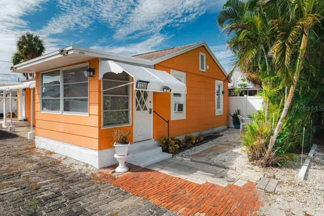 a backyard of a house with seating space