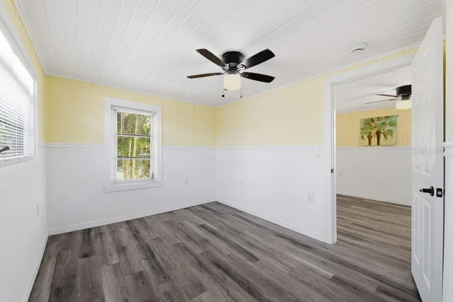 a bathroom with a sink a mirror and a shower