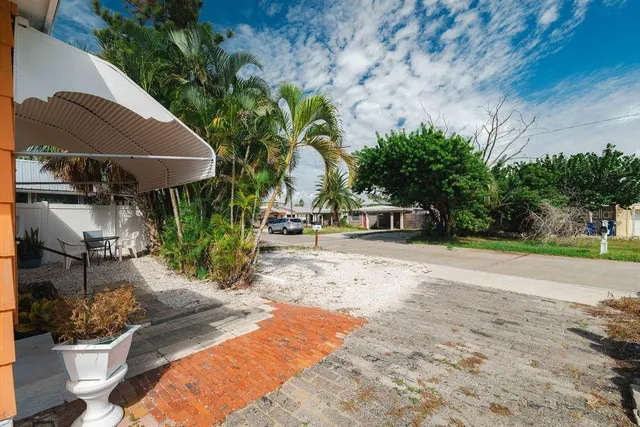 a view of a backyard of a house