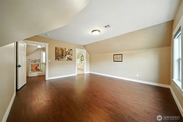 a view of a livingroom with wooden floor