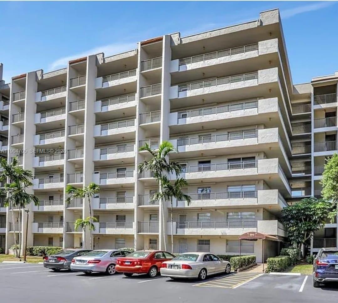 3910 Inverrary Boulevard, Unit 703B Lauderhill, FL 33319 - Photo 2 of 30 a front view of a multi story building