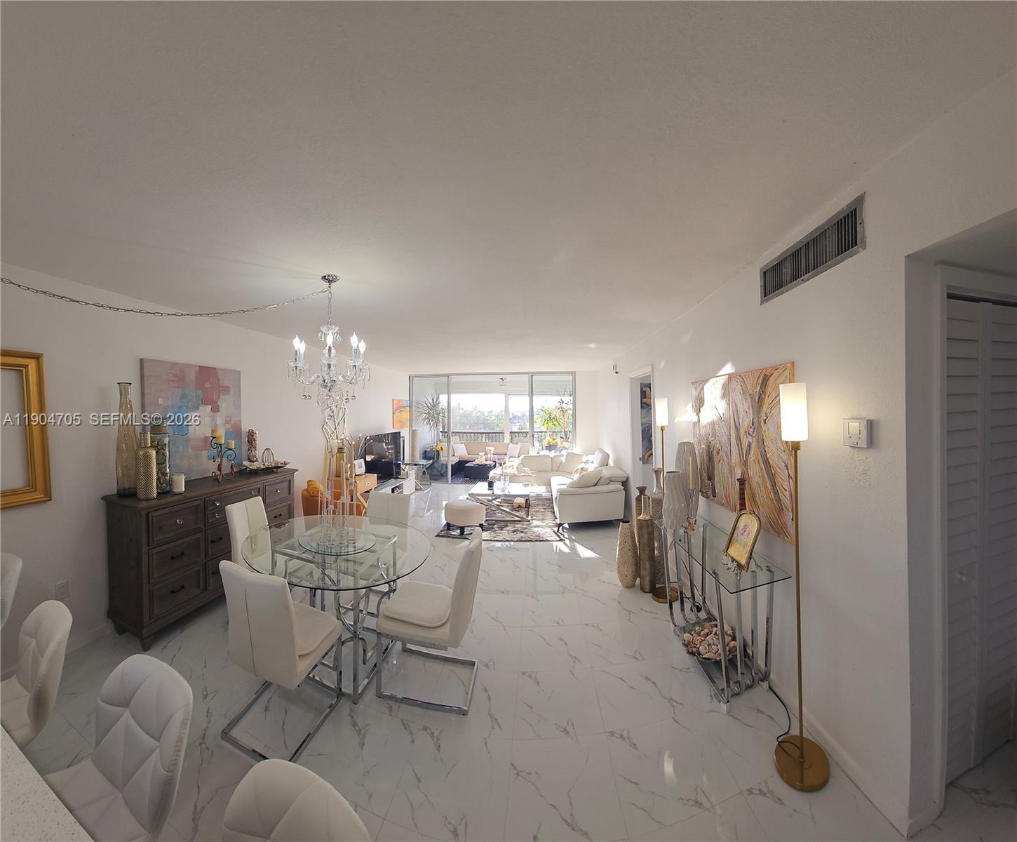 3910 Inverrary Boulevard, Unit 703B Lauderhill, FL 33319 - Photo 21 of 30 a view of a livingroom and dining room