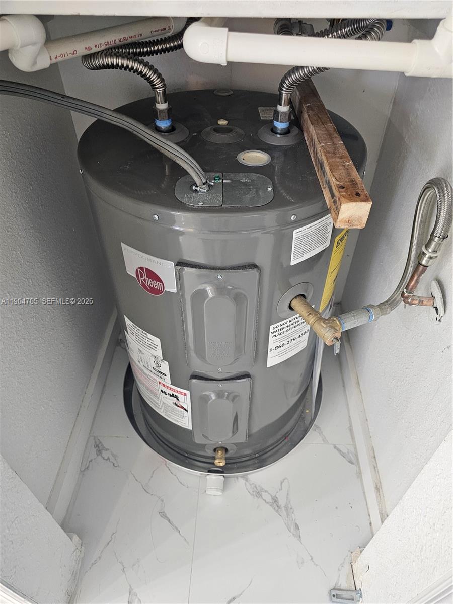 3910 Inverrary Boulevard, Unit 703B Lauderhill, FL 33319 - Photo 30 of 30 a view of water heater