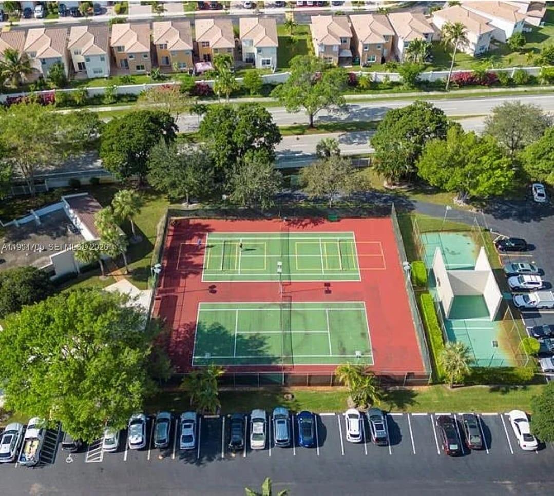 3910 Inverrary Boulevard, Unit 703B Lauderhill, FL 33319 - Photo 6 of 30 a view of building with garden and stairs