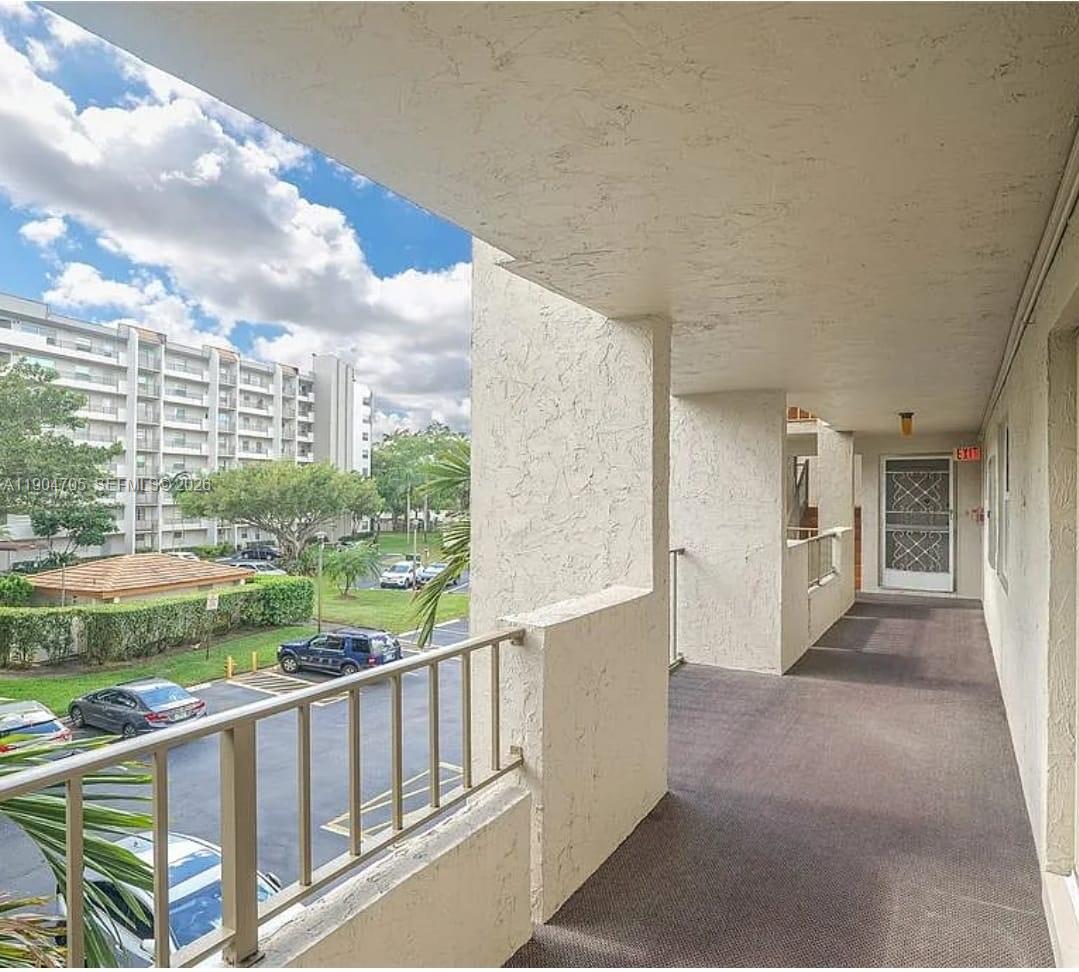 3910 Inverrary Boulevard, Unit 703B Lauderhill, FL 33319 - Photo 8 of 30 a view of a city from a balcony