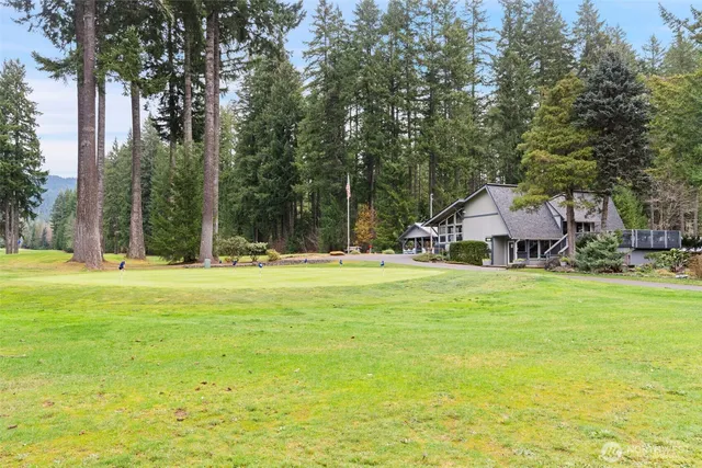 a view of a house with a big yard