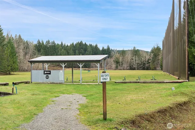 a view of a house with a big yard