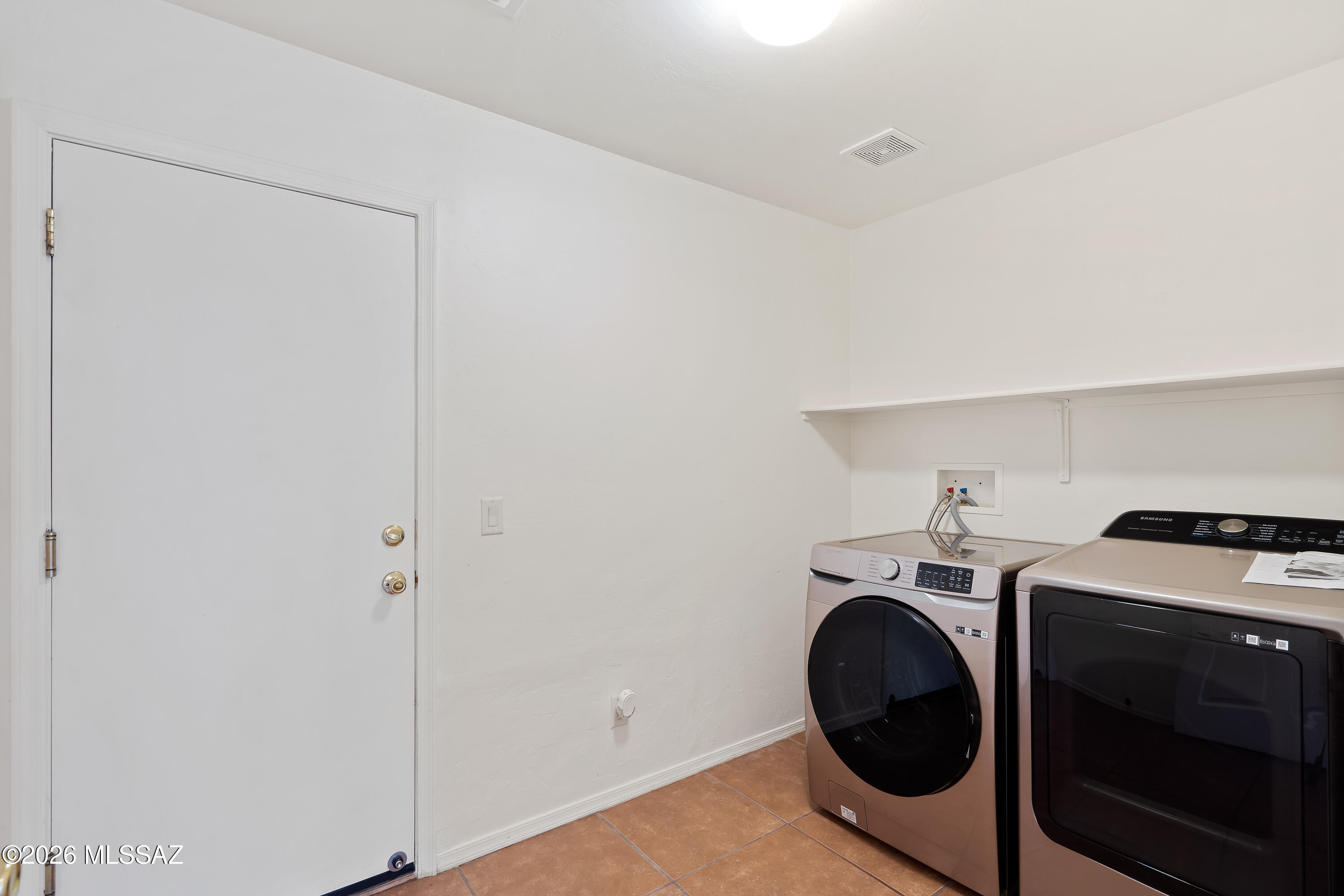 675 West Ash Ridge Drive Green Valley, AZ 85614 - Photo 7 of 33 Laundry Room