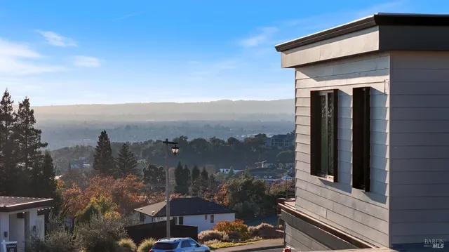a view of a balcony with an outdoor space