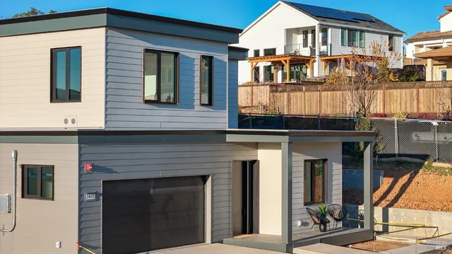 a front view of a house with a porch