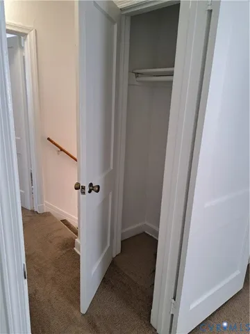 a view of a livingroom with wooden floor